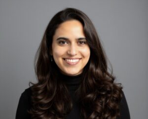 A headshot of Aradhna Mangla